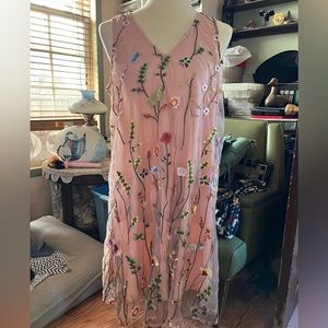 Sleeveless pink embroidered dress